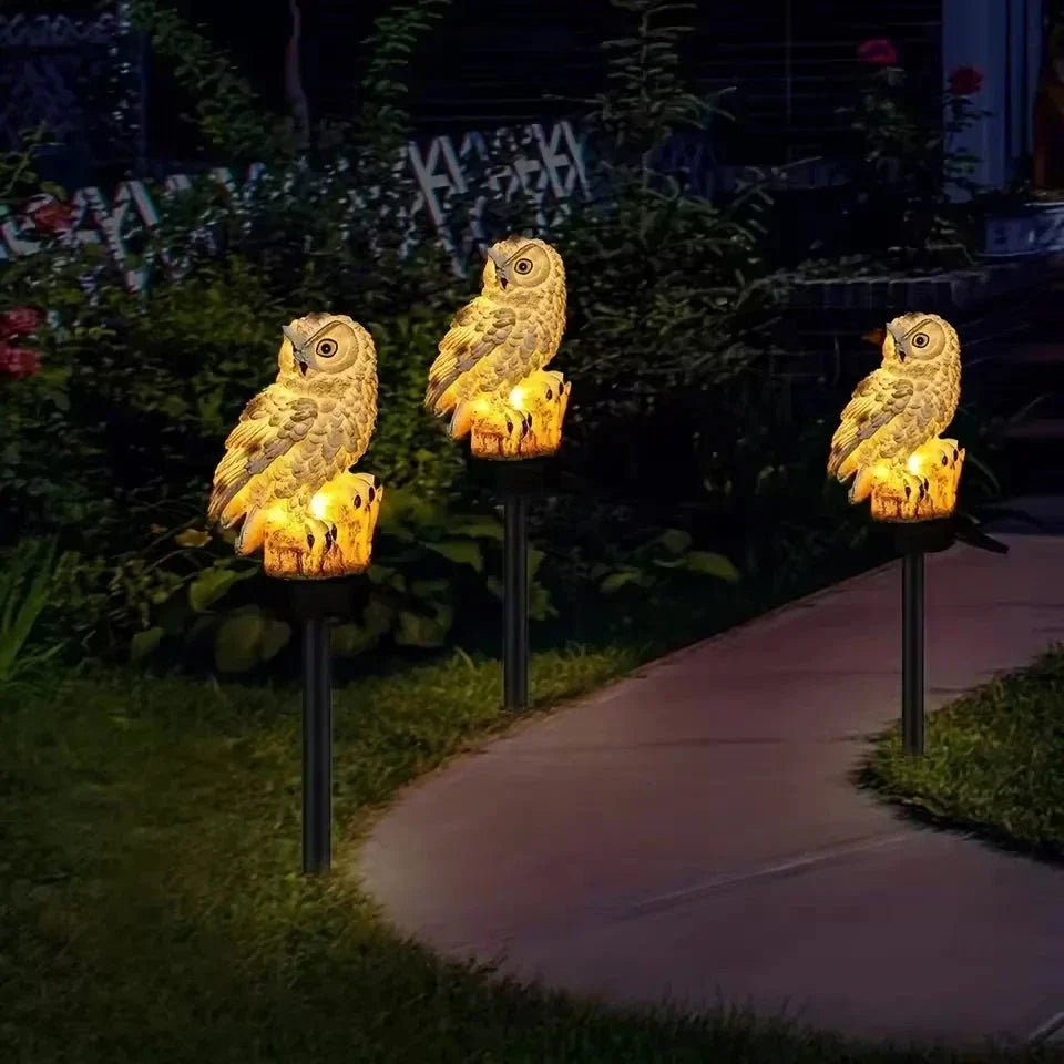 🦉 Light up your garden path today with these solar-powered owl path lights!